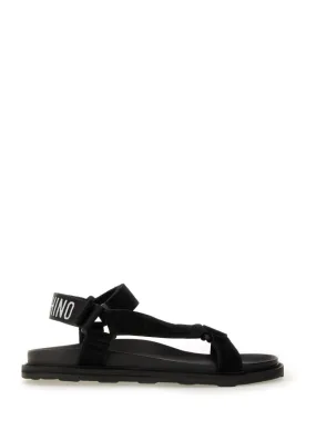 Slip On Feature Foot Freedom Fit Black Sandals With Iconic Logo Strap
