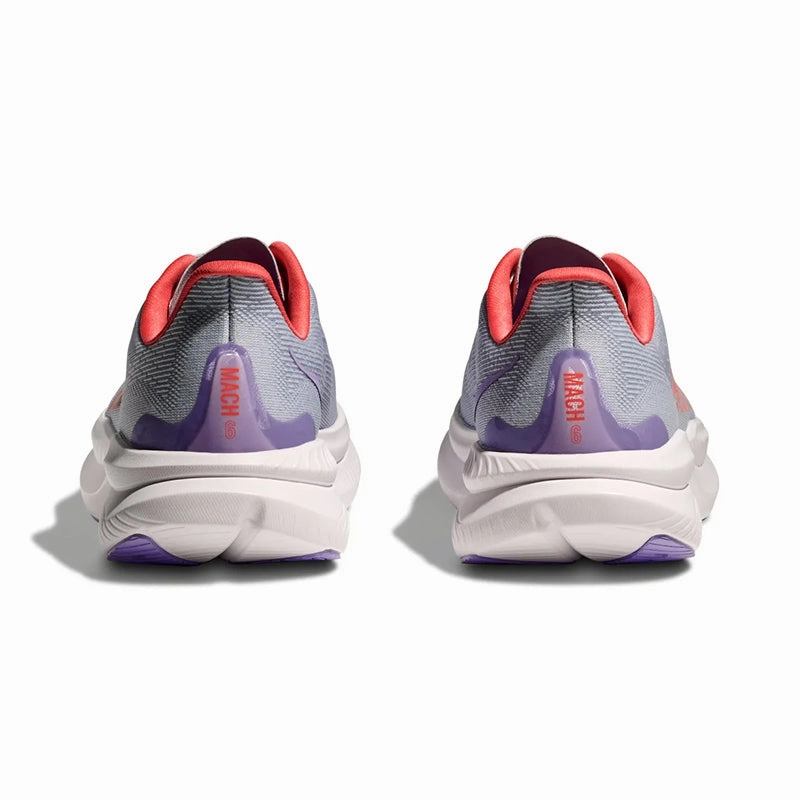 Women's Mach 6 Pale Dusk/Gull running in a butte area shoes