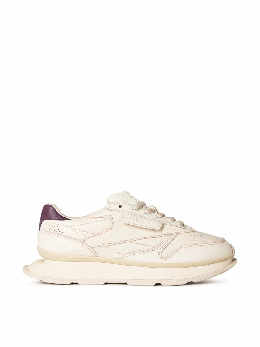 running in a mud pot area shoes Classic Leather Ltd Garment Off White Sneakers
