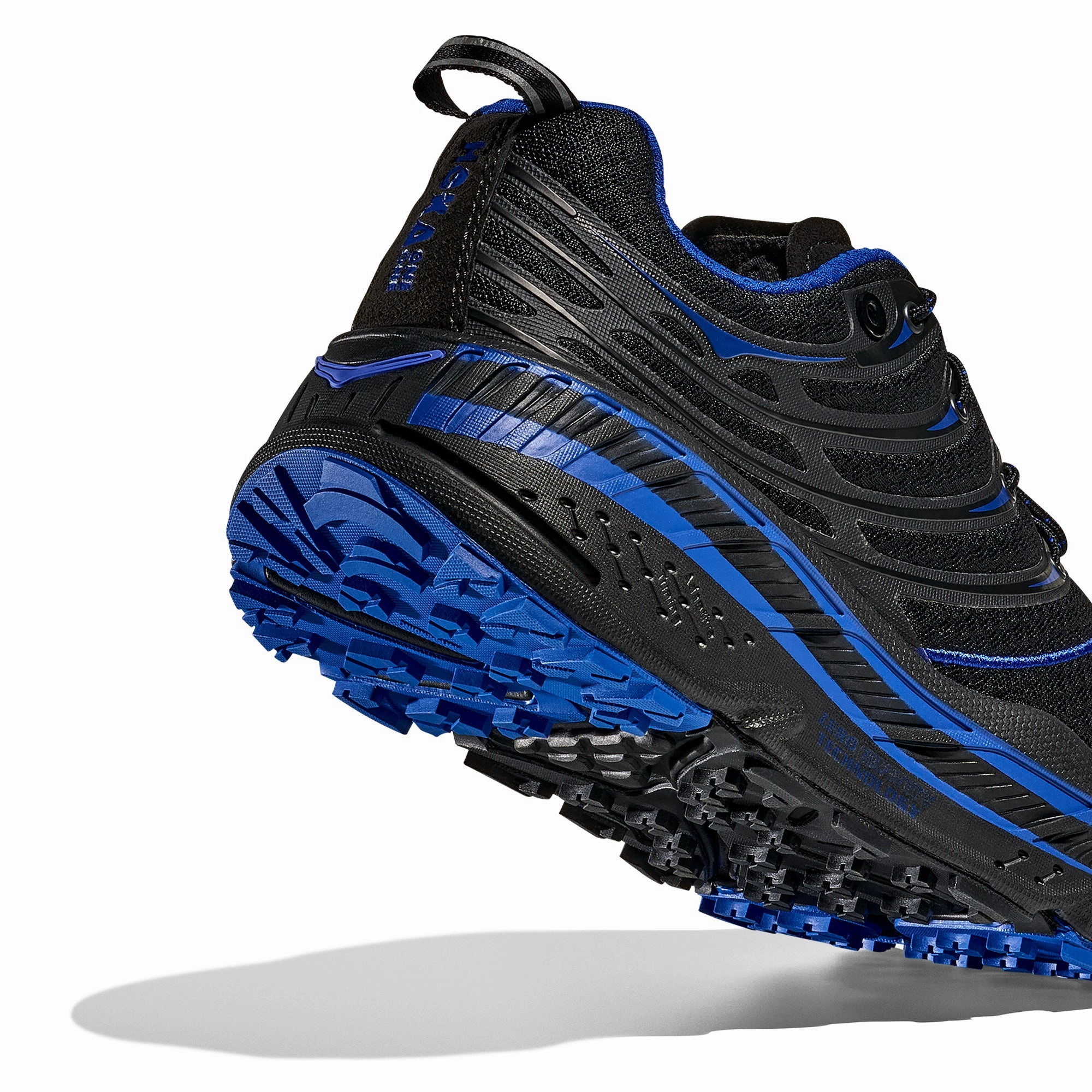 Hoka U Stinson EVO OG Shoes running with a fanny pack