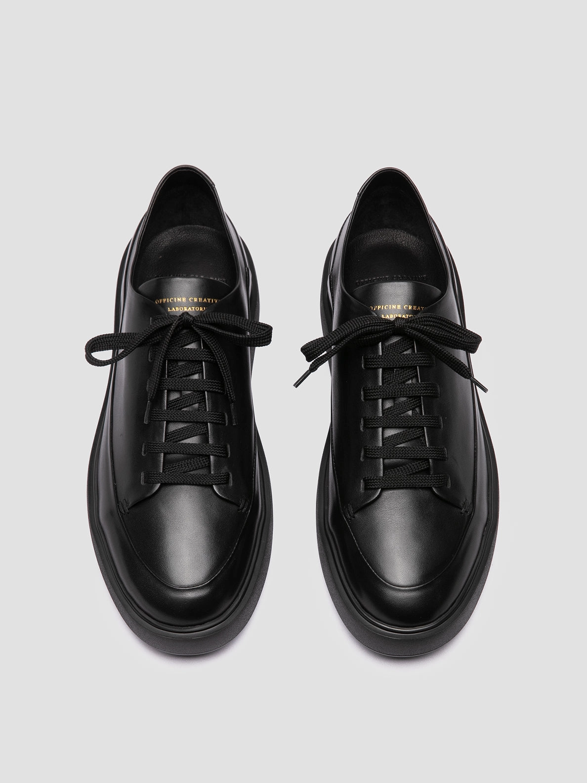 Grip Enhancing Outsole Ventilated Footbed System RELEASE 001 - Black Leather Low Top Sneakers