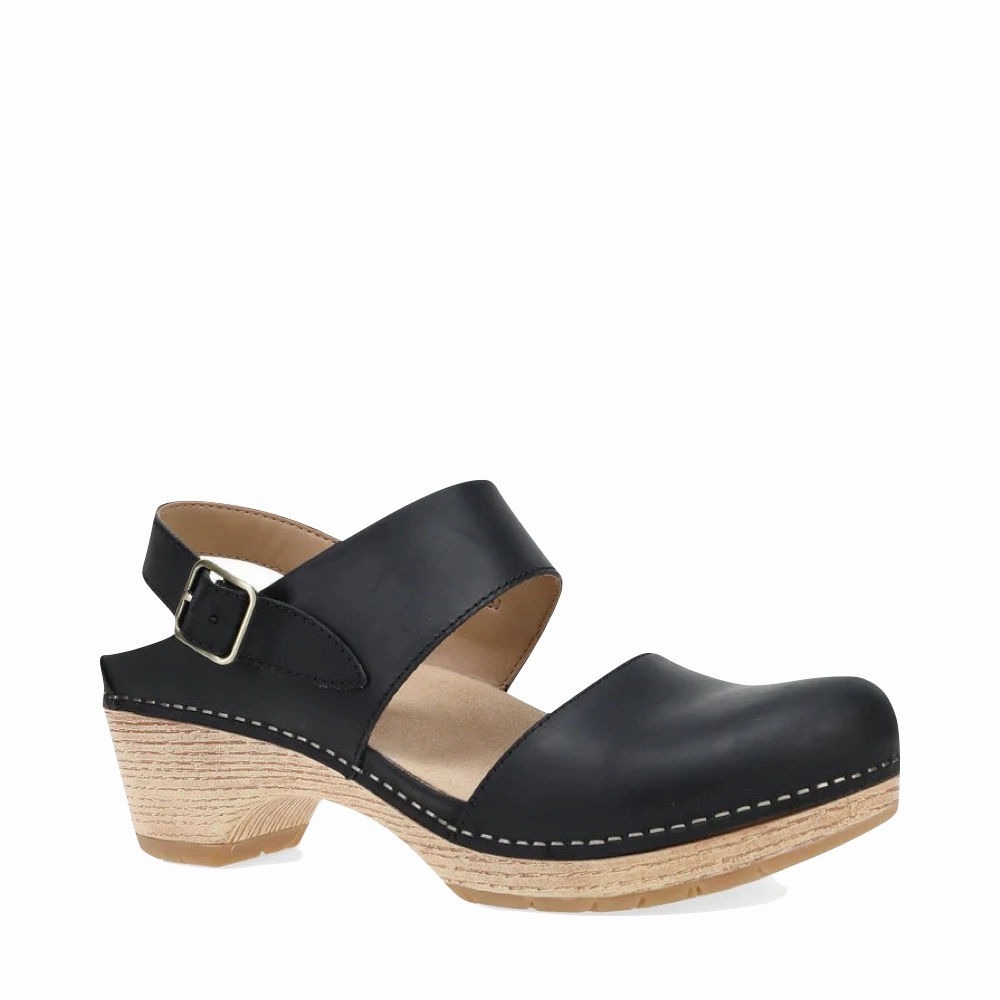 Dansko Women's Lucia Heeled Closed Toe Clog in Black Firm Grip