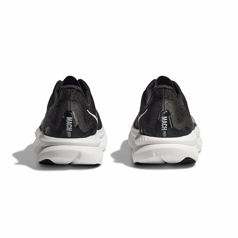 Women's Mach 6 Black/White running with a group
